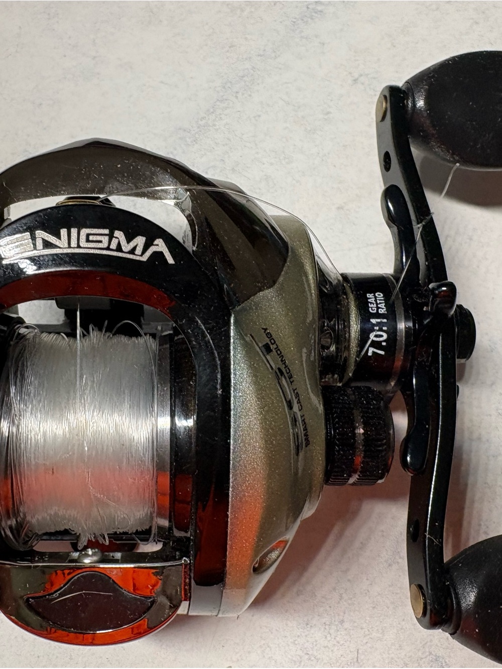 Bass Pro Shops Enigma Smart Cast Reel - Black and Gold - Picture 4 of 10
